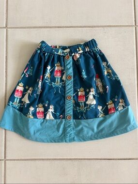 Millie Loves Lily Girls Teal Nutcracker Print Button Front Skirt